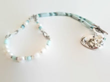 Load image into Gallery viewer, Amazonite and Pearl Necklace with Bird Pendant additional view.
