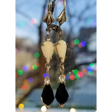 Load image into Gallery viewer, Vintage Milk Glass Crystal and Jet Swarovski Earrings, hanging.
