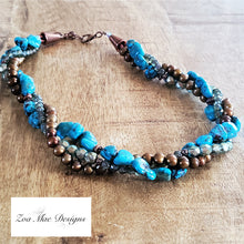 Load image into Gallery viewer, Turquoise Twist Necklace on wooden background.
