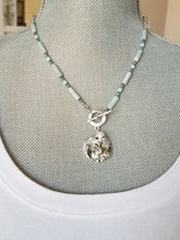 Load image into Gallery viewer, Amazonite and Pearl Necklace with Bird Pendant on model.
