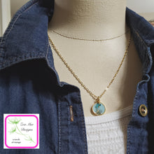 Load image into Gallery viewer, Antique Gold Mini Glitter Necklace on model.
