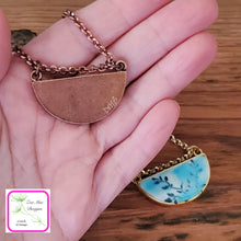 Load image into Gallery viewer, Stamped Clay Vine Half-Moon Necklace
