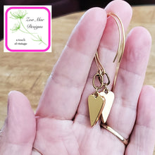 Load image into Gallery viewer, Back side of Antique Gold dangle heart earrings.
