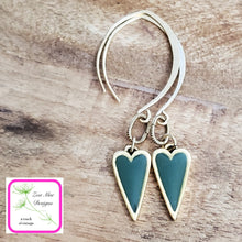 Load image into Gallery viewer, Antique Gold dangle heart earrings in green.
