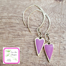 Load image into Gallery viewer, Antique Gold dangle heart earrings in Pink.
