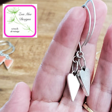 Load image into Gallery viewer, Back side of Antique Silver dangle heart earrings.
